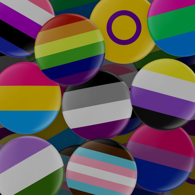 A variety of colourful LGBTQ/ queer and trans community buttons